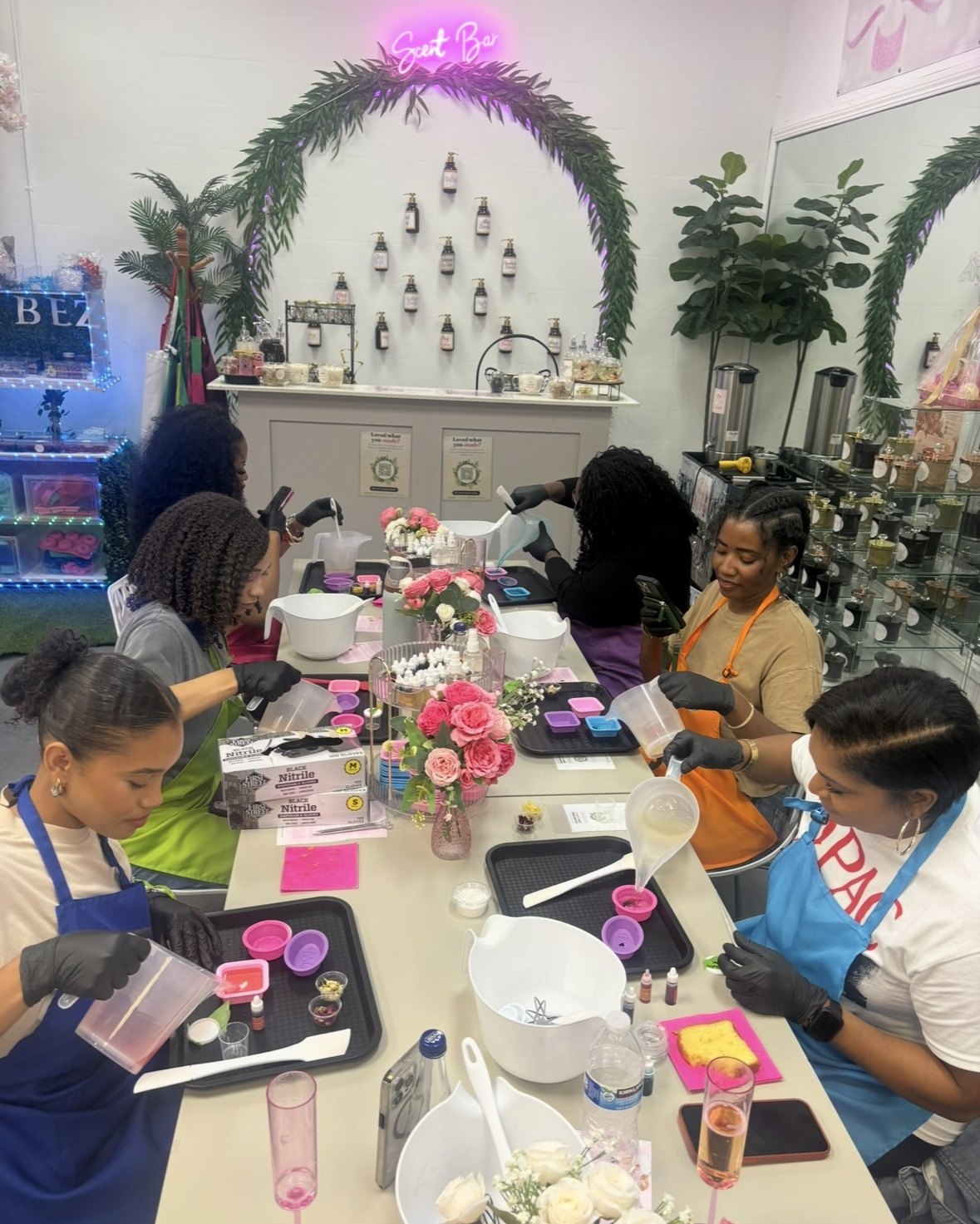 A group making candles together at Fragrance of Elegance in Inglewood